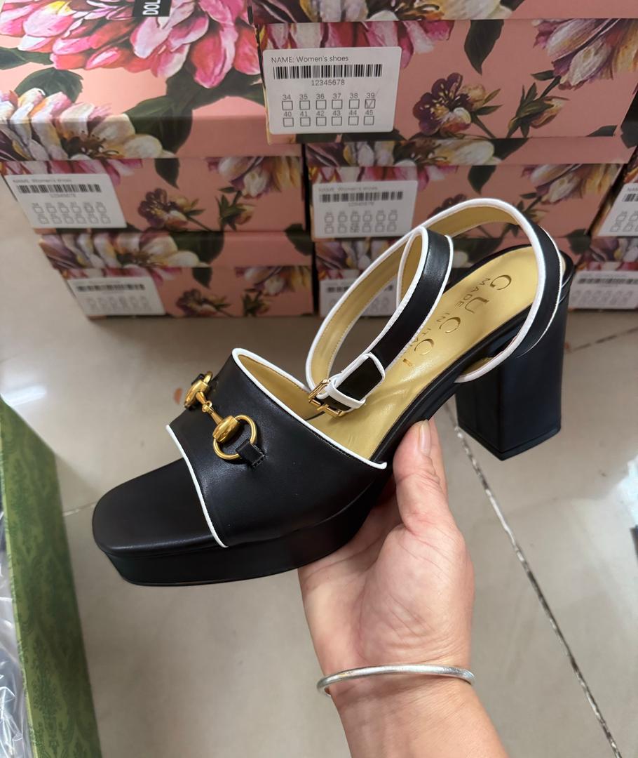 Black Gucci sandals